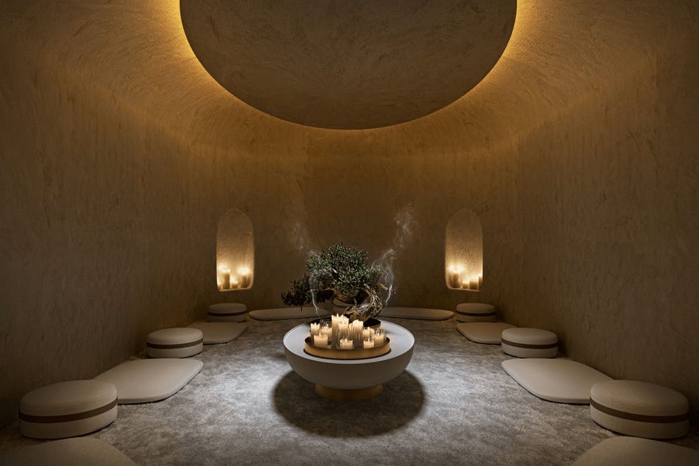 Inside a meditation room with pillows on the floor at Saint Haven.